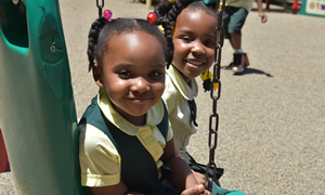 Girls on swing